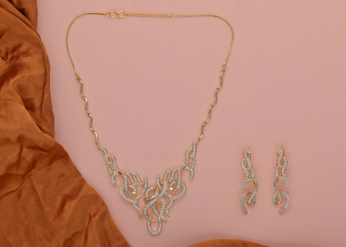 Close-up of Joban Fashion brass necklace set with golden finish and white AD stones