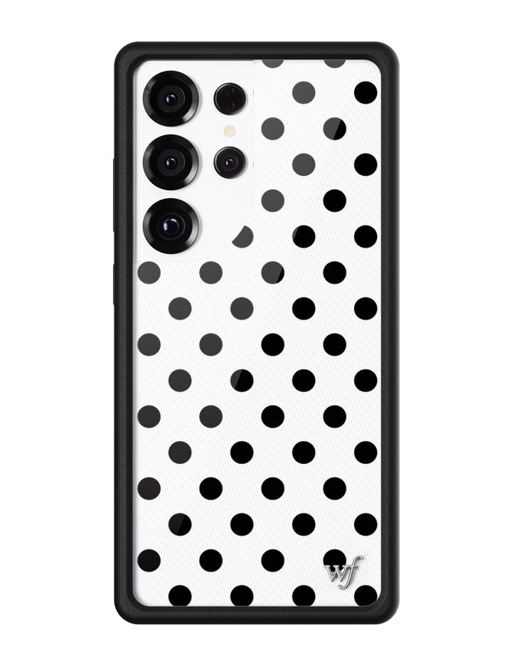 Samsung Galaxy phone case with white and black polka dot pattern and black rubber bumper