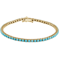 14K yellow gold bracelet featuring 64 round-cut natural turquoise stones in a 7.5-inch design.