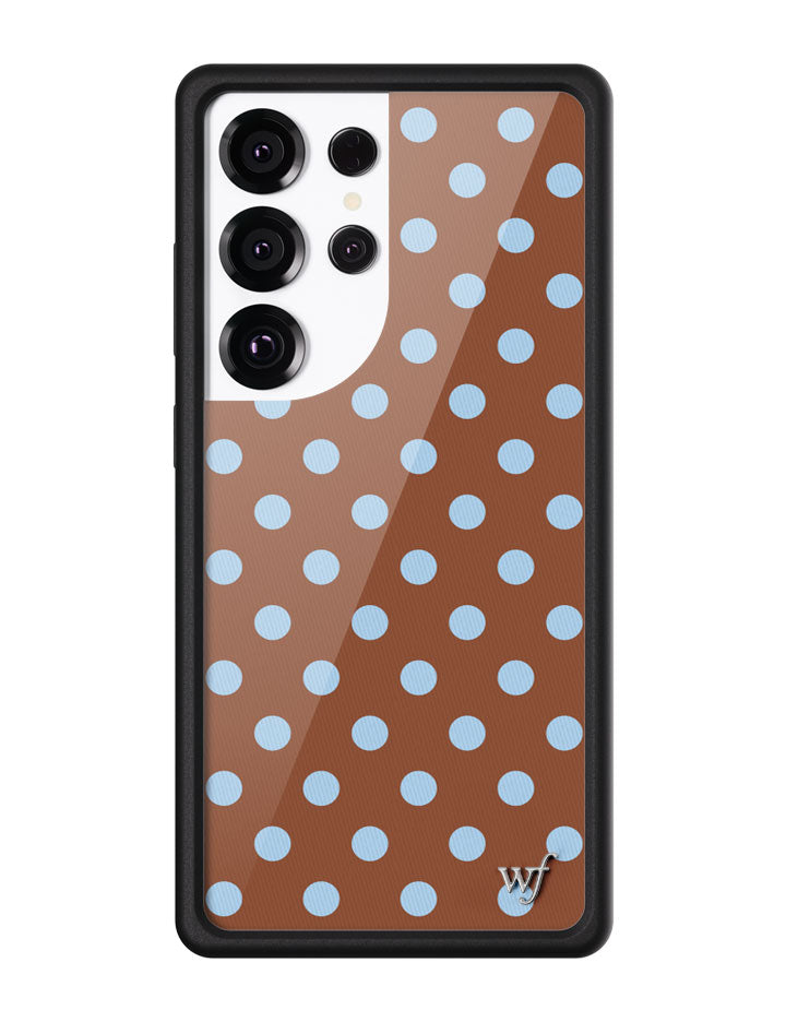 Brown Samsung Galaxy phone case with light blue polka dot pattern and black protective bumper