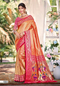 Pink and Orange Kanjivaram silk wedding saree with intricate zari weaving and lace border detail