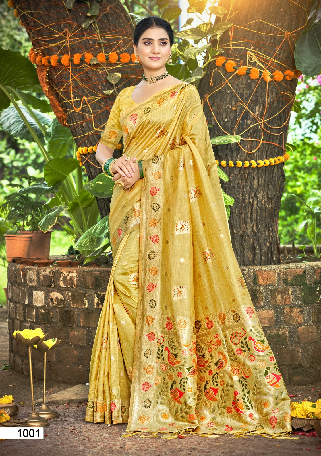 Yellow Assam silk saree featuring fine gold zari weaving and lace border detail
