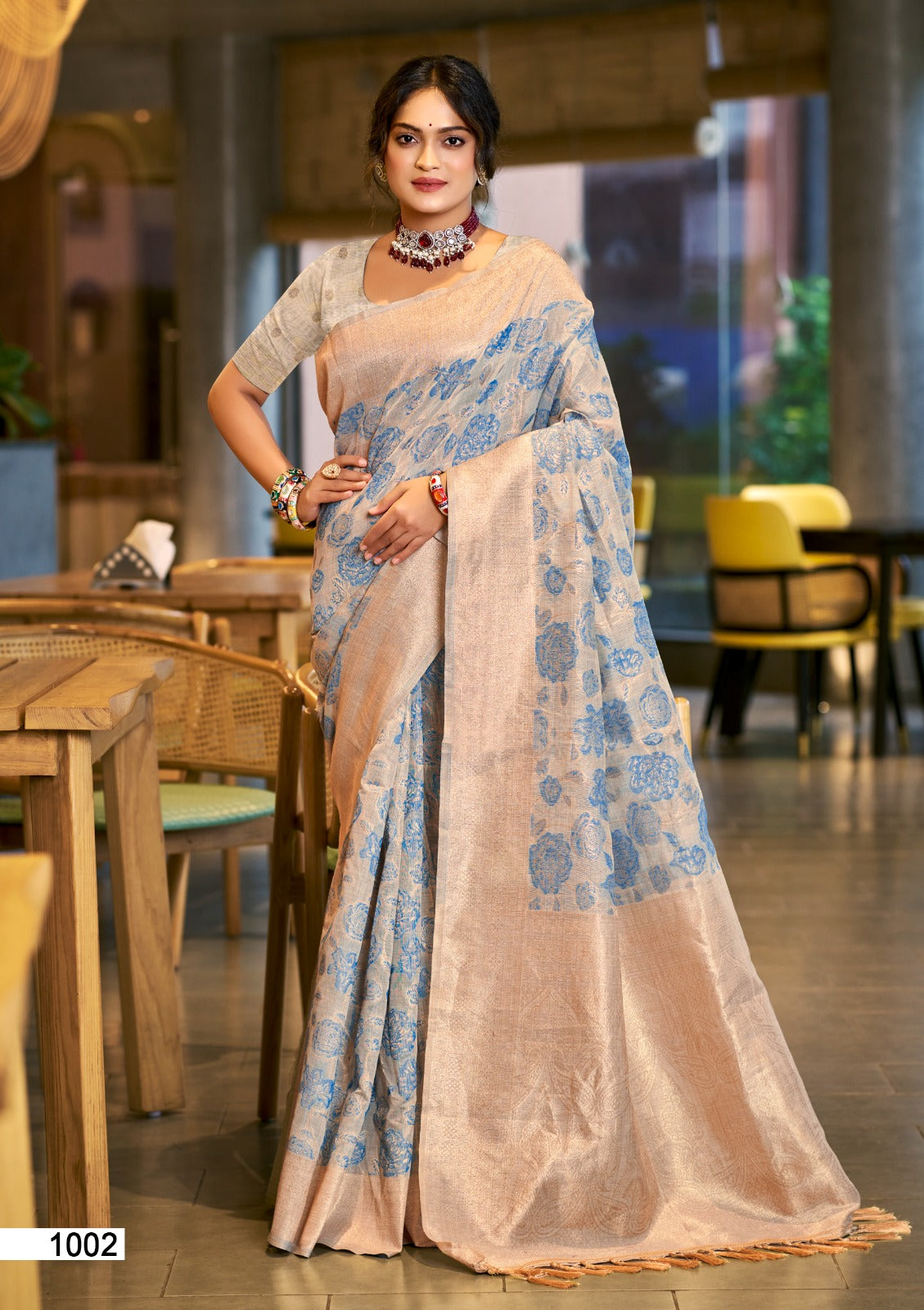 Sky blue cotton silk wedding saree with gold zari weaving border and lace detailing