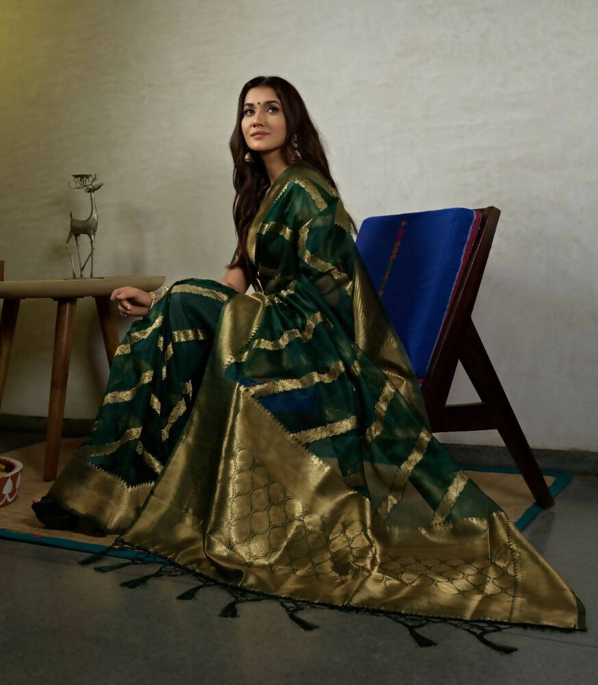 Stone Green Organza Silk Saree with Elegant Weaving and Tassels