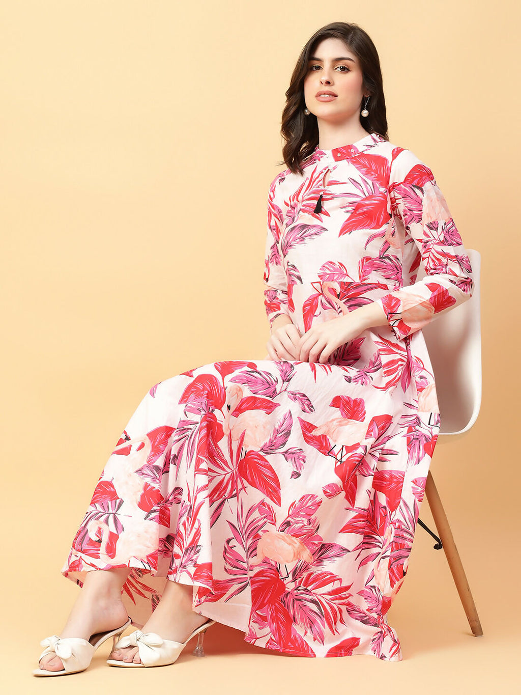 Vibrant red and pink cotton bohemian dress with tropical print and hand-worked details.