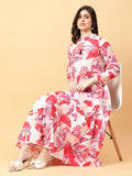 Vibrant red and pink cotton bohemian dress with tropical print and hand-worked details.