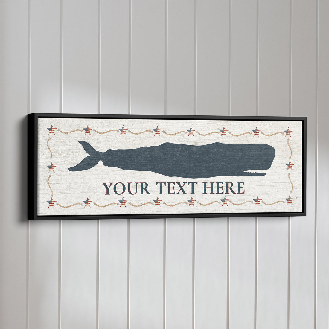 Personalized framed canvas sign featuring a hand-drawn whale in soft coastal colors for a nautical nursery theme.
