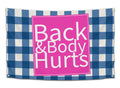 Blue, white, and pink Back & Body Hurts wall flag with plaid pattern