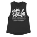 A stylish girls tank top with modern elongated armholes and a curved hem, designed for comfortable layering.