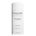 White bottle of Leonor Greyl Bain Traitant à la Propolis, 6.7 oz, professional anti-dandruff hair treatment.