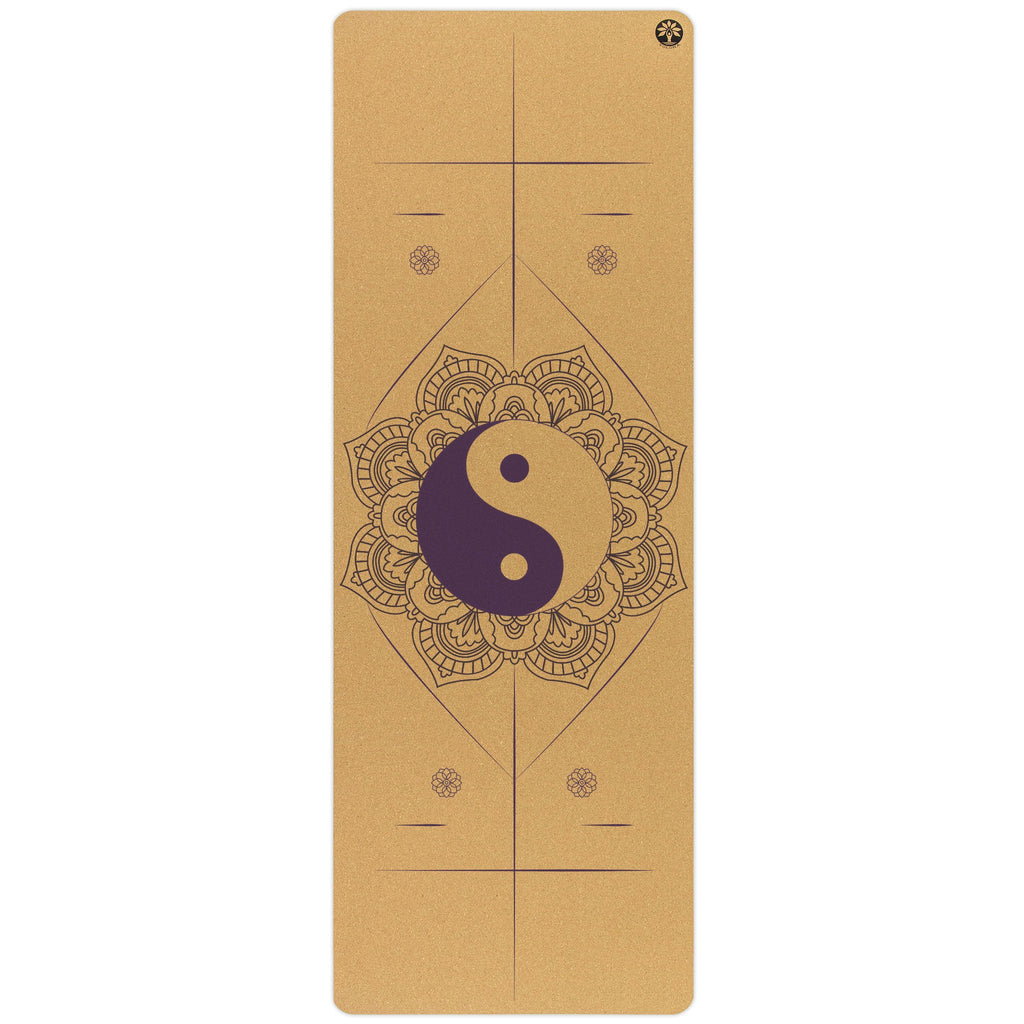 Tan, dark green, and purple Aura cork yoga mats showing fine-grain texture and eco-friendly design.