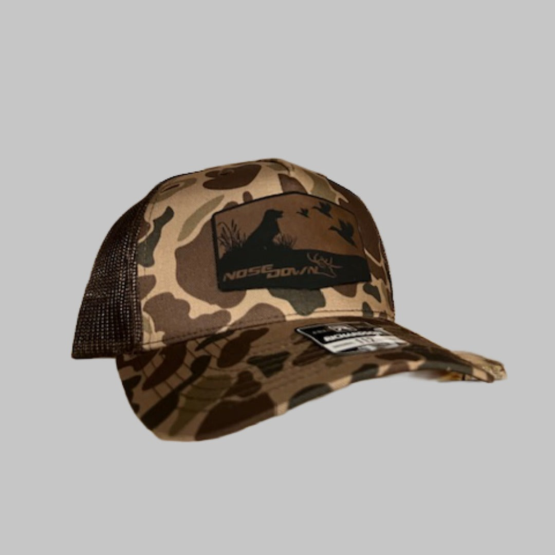 Big Duck Dog Trucker Hat in a structured outdoor style with mesh back