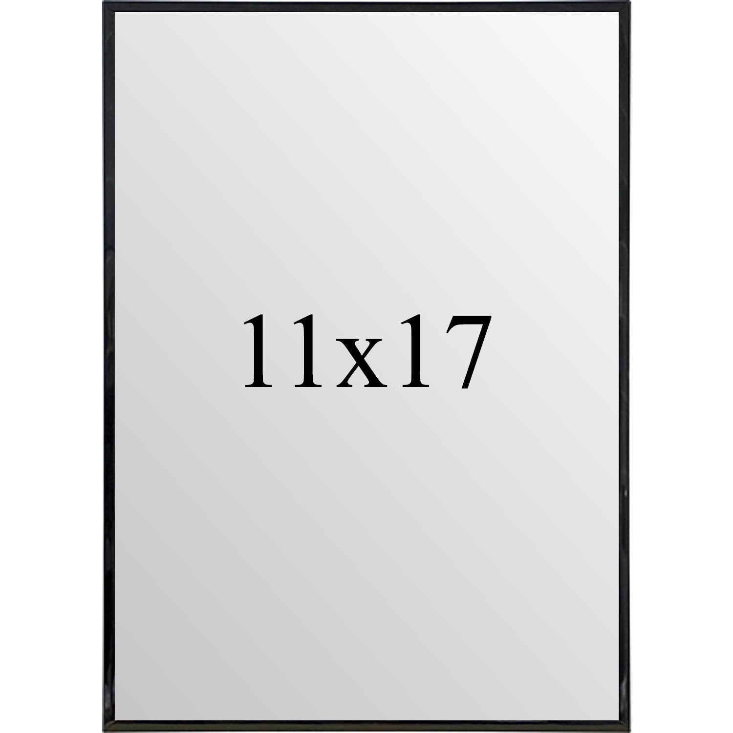 Modern 11x17 black metal poster frame displayed on a gallery wall