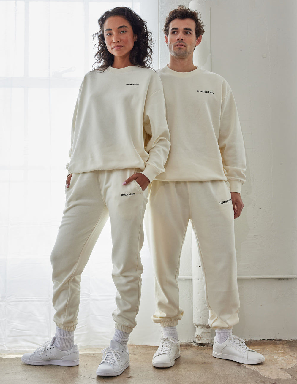 Front view of the Basics White Sand Unisex Crewneck in premium fleece