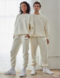 Front view of the Basics White Sand Unisex Crewneck in premium fleece