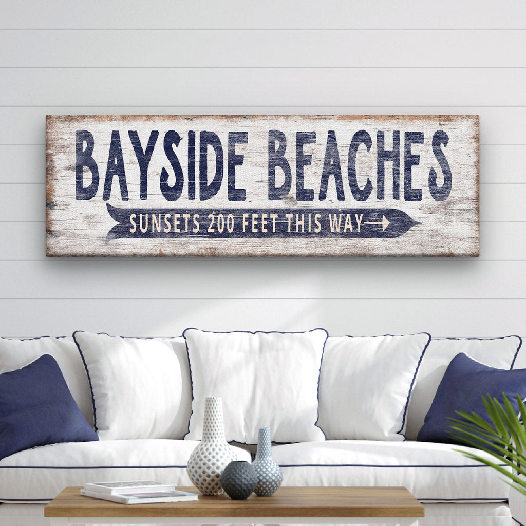 Personalized nautical beach sign with navy typography and directional arrow on weathered white wood background