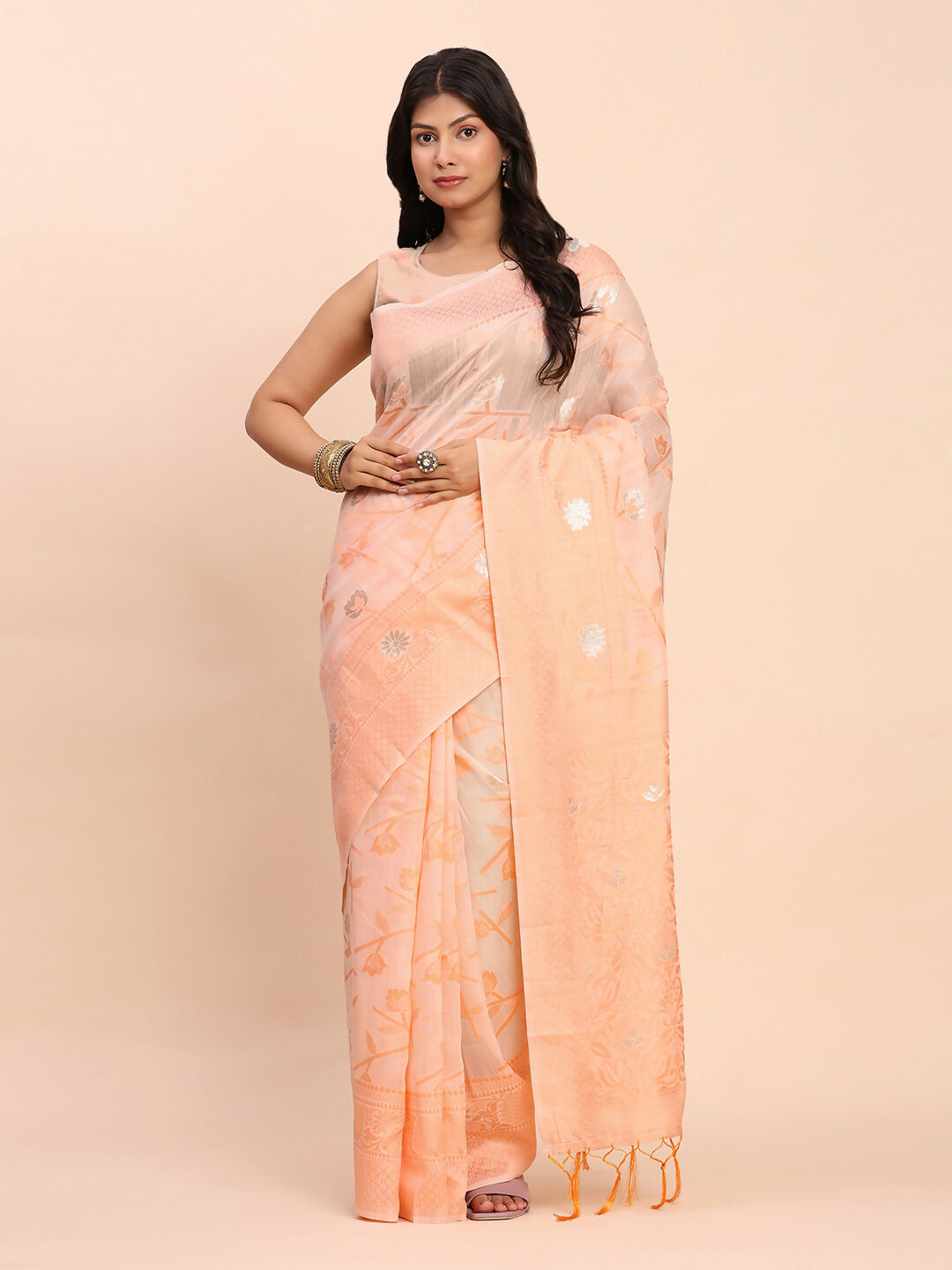 Peach colored linen cotton saree with matching blouse