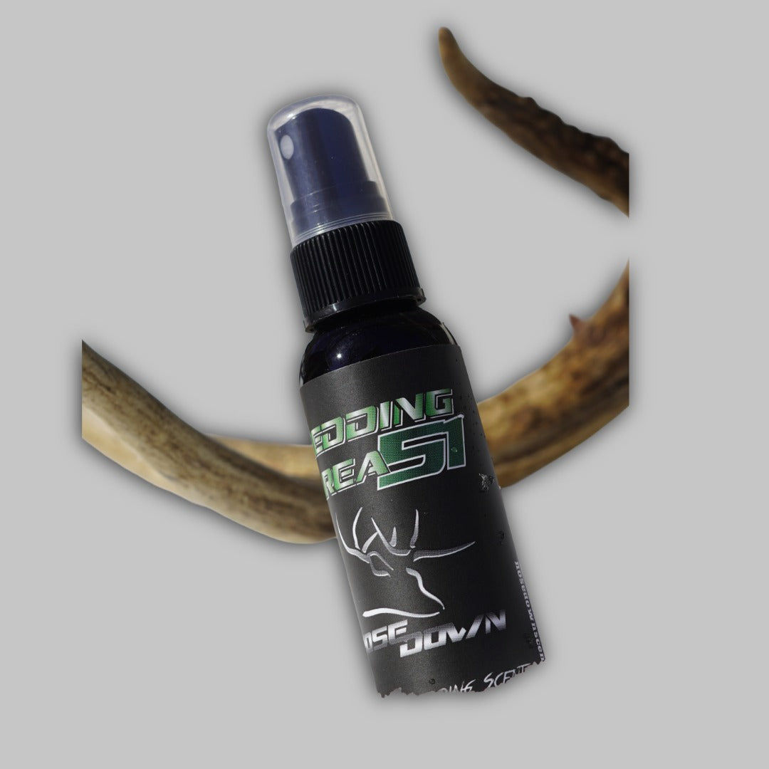 Bedding Area 51 2oz spray bottle with black label and green text, outdoor hunting scent.