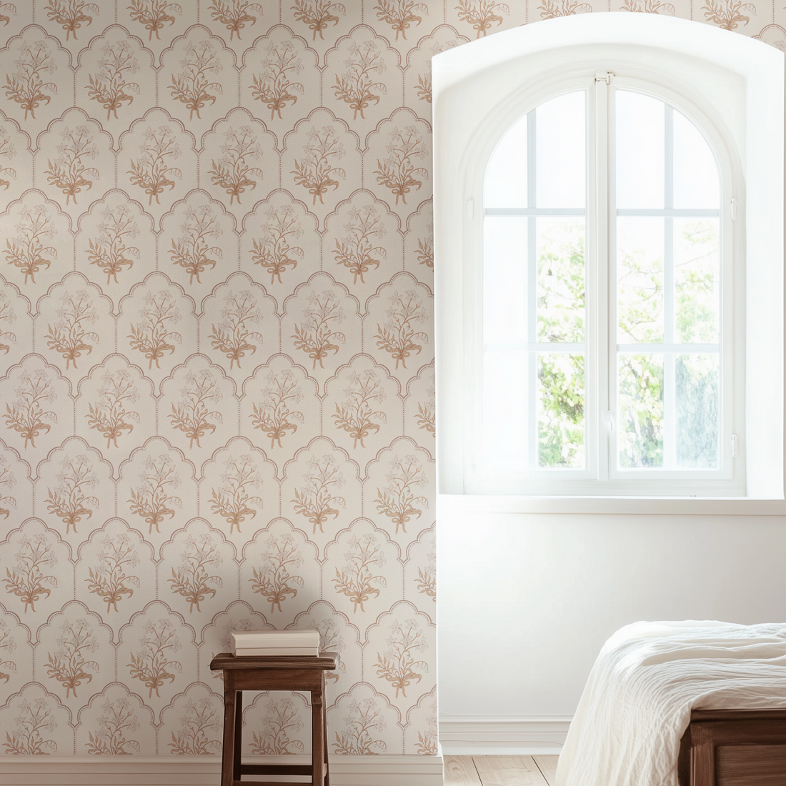 Close up of Oren wallpaper featuring floral patterns in sage green and off-white on a dark charcoal background.