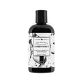 Beekman 1802 Vanilla Absolute Conditioner bottle in black and white minimalist packaging.