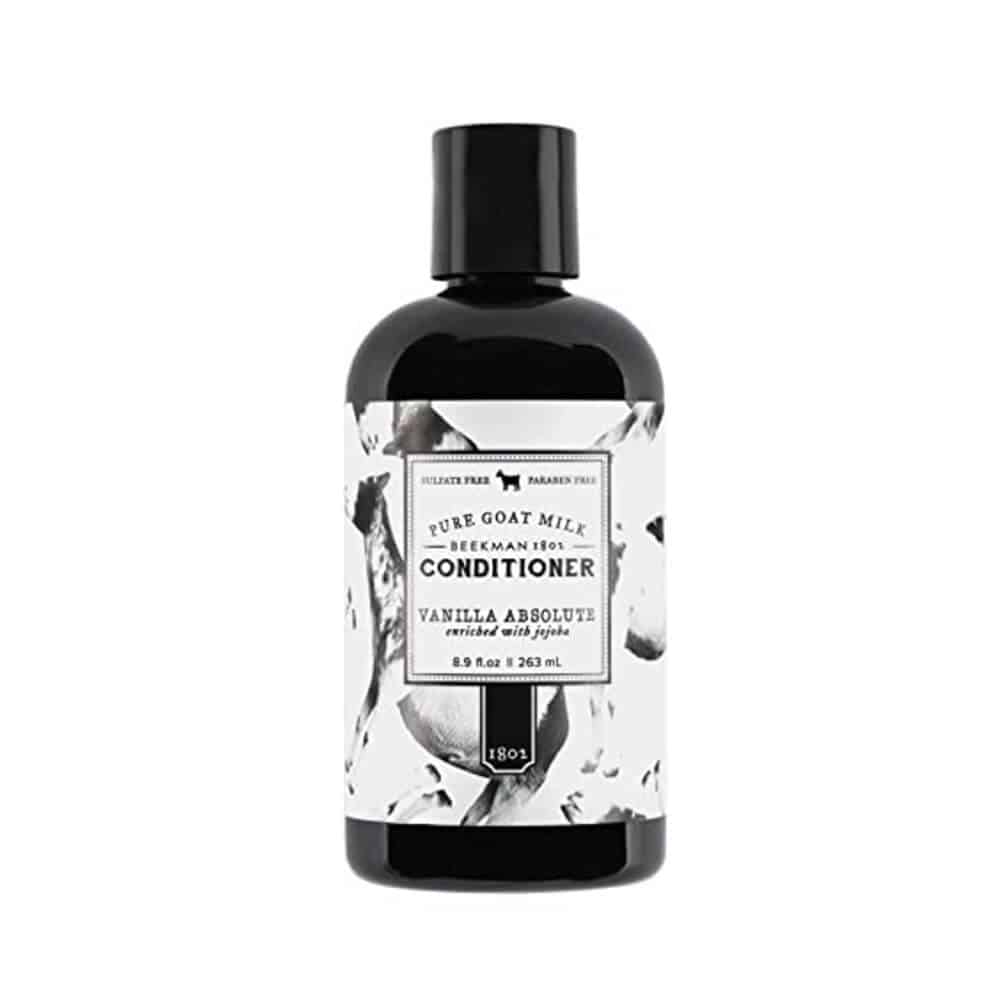Beekman 1802 Vanilla Absolute Conditioner bottle in black and white minimalist packaging.