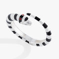 A stylized black and white striped sandworm-inspired cuff bracelet, showcasing the gothic design and silver-tone accents.