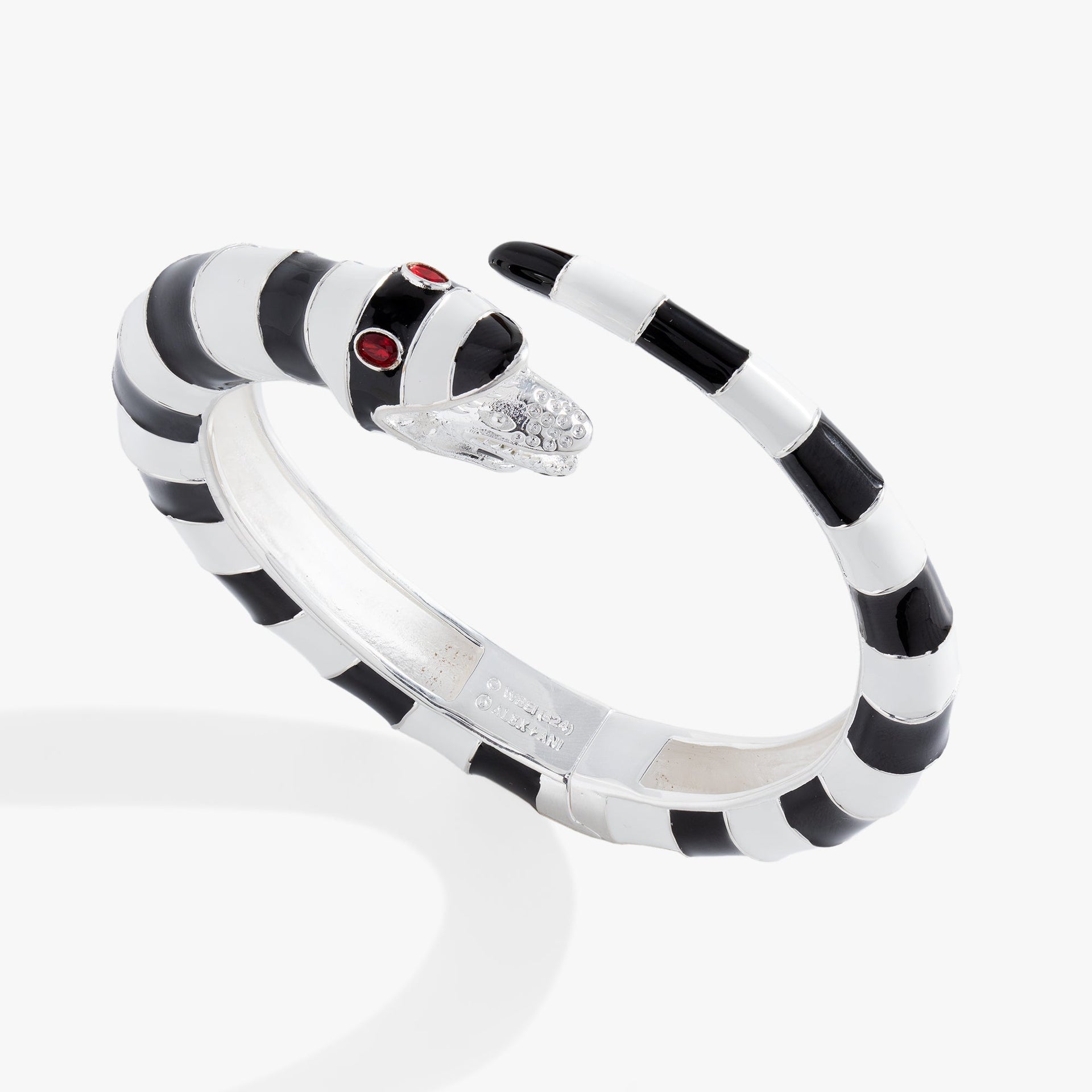 A stylized black and white striped sandworm-inspired cuff bracelet, showcasing the gothic design and silver-tone accents.