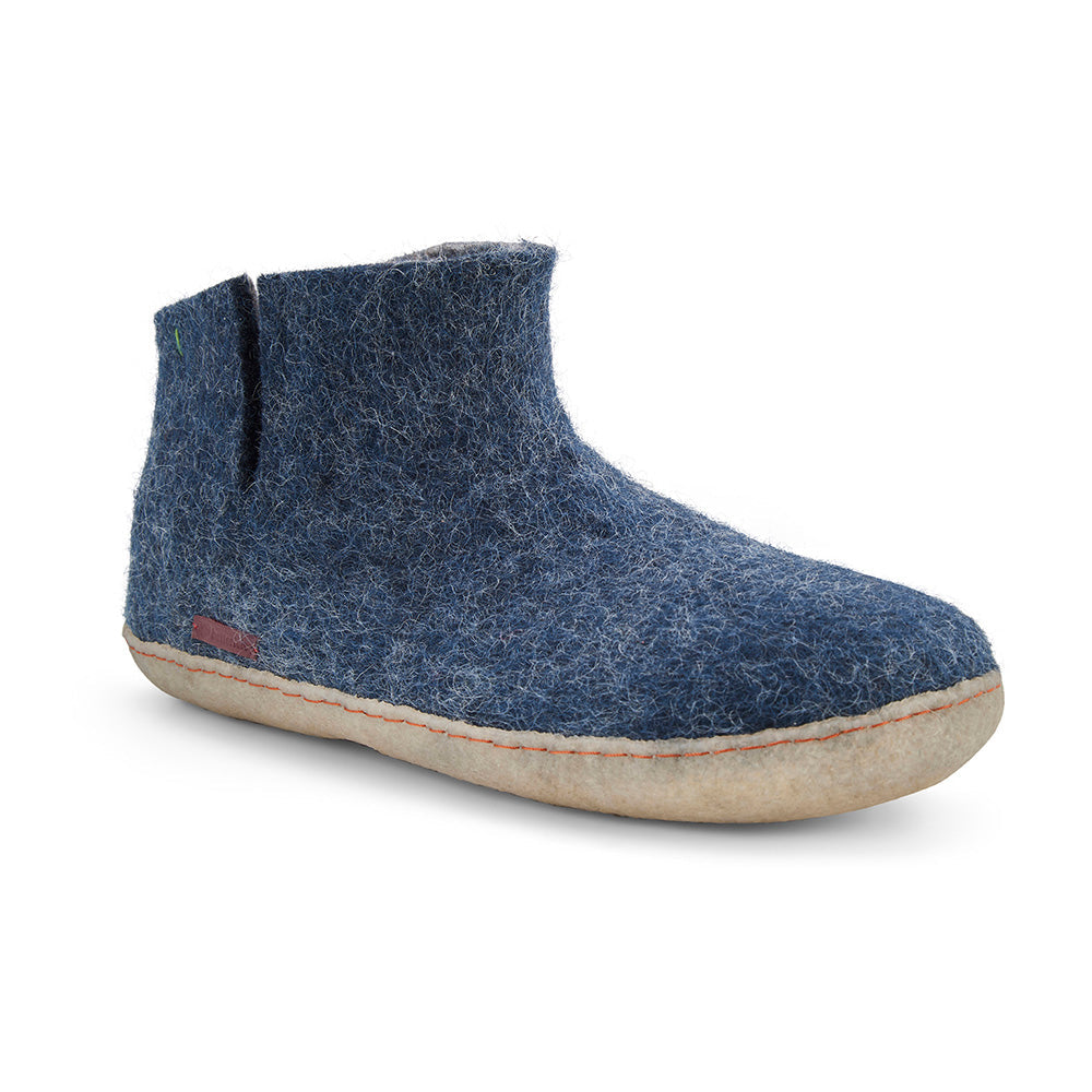 Women's classic navy wool boot featuring a round toe and textured rubber sole