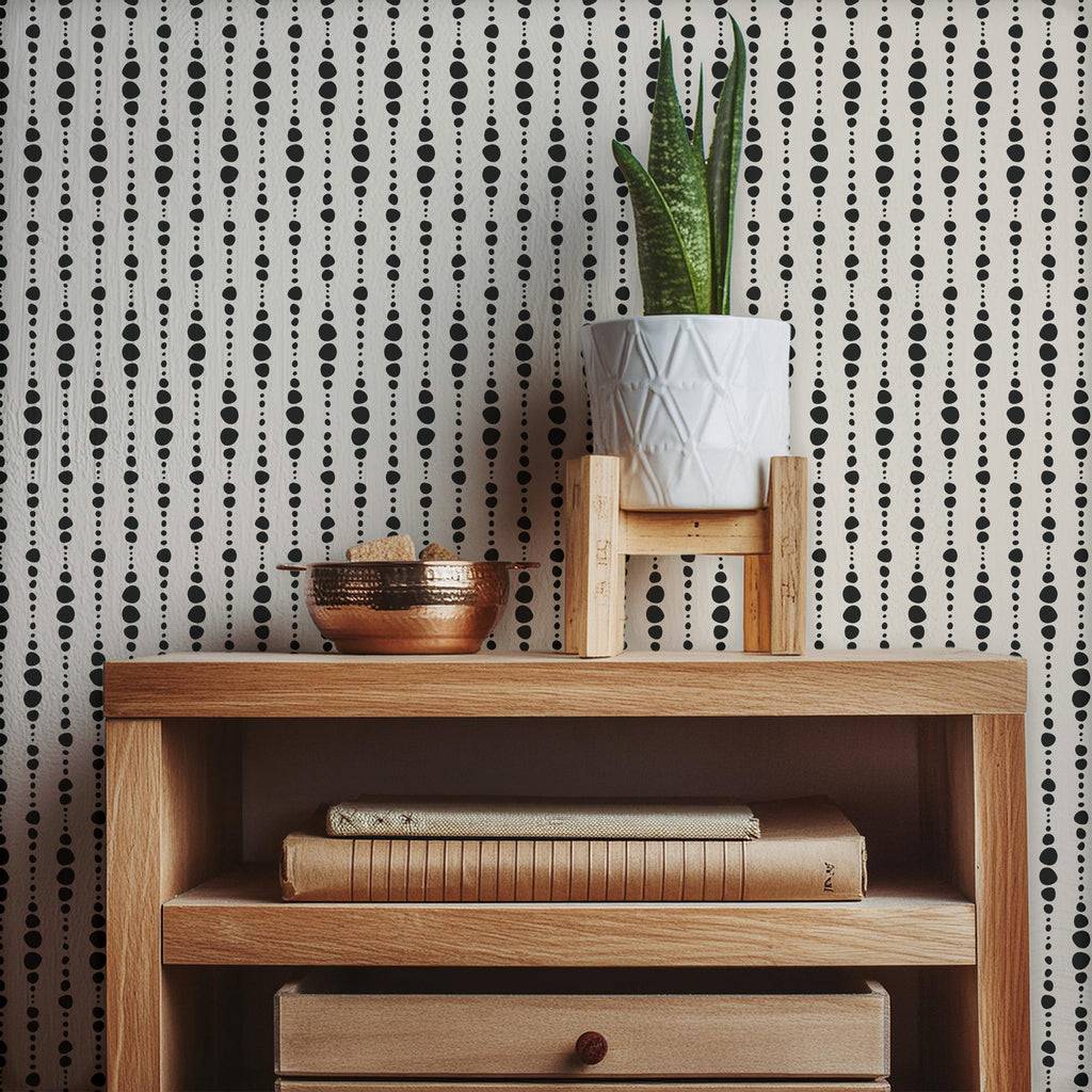 Blake geometric wallpaper in a modern black, white, and blush-pink color palette.