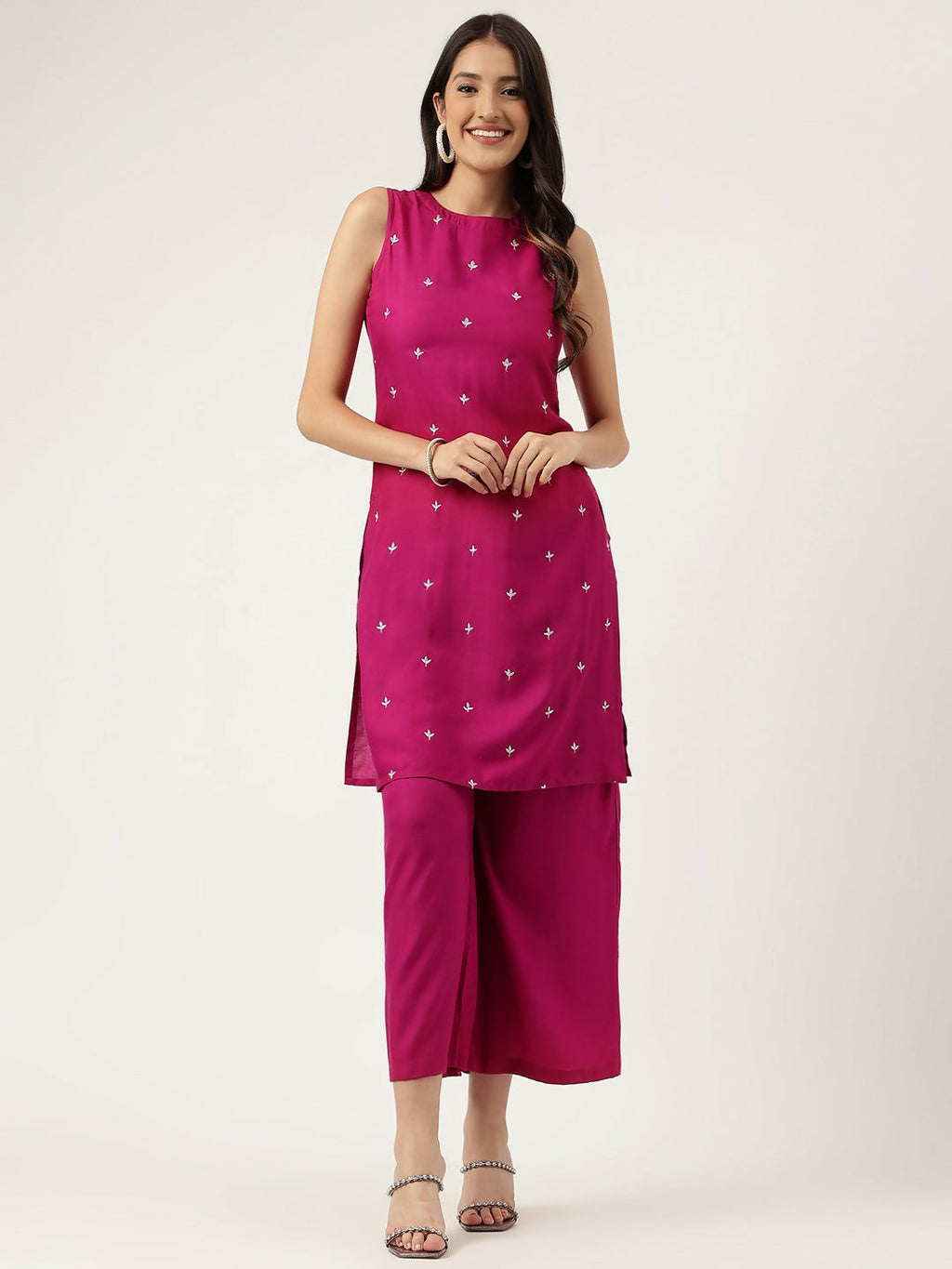 Pink straight kurta and bottom set with intricate embroidery work in soft rayon fabric.