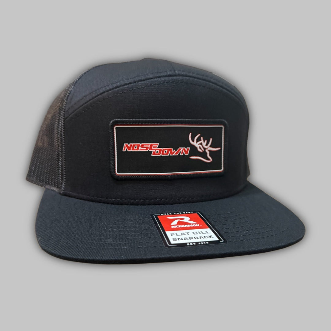 Black and Red Woven 7 Panel Hat with a bold color contrast and structured brim