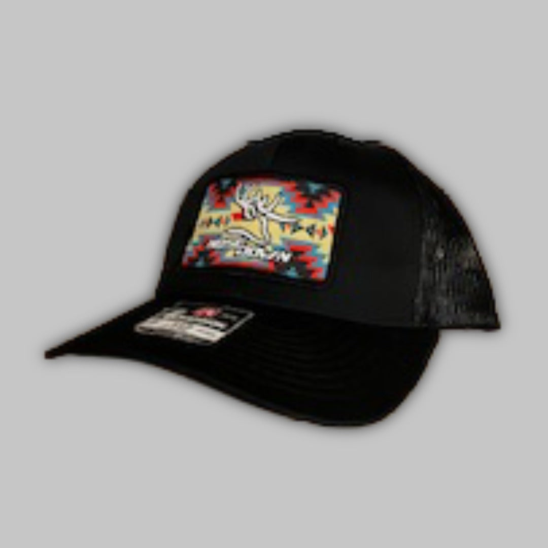 Western-themed patch trucker hat with geometric pattern and snapback closure