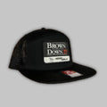 Brown Down 26 7-Panel hat featuring a structured crown and adjustable snapback closure.