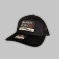 Brown Down woven patch trucker hat with mesh back and snapback closure