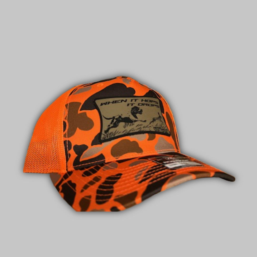 Hop it Drops rabbit hunting trucker hat in orange and brown colorway