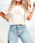 Woman wearing a Boy Mama Minimalist cotton t-shirt in neutral colors