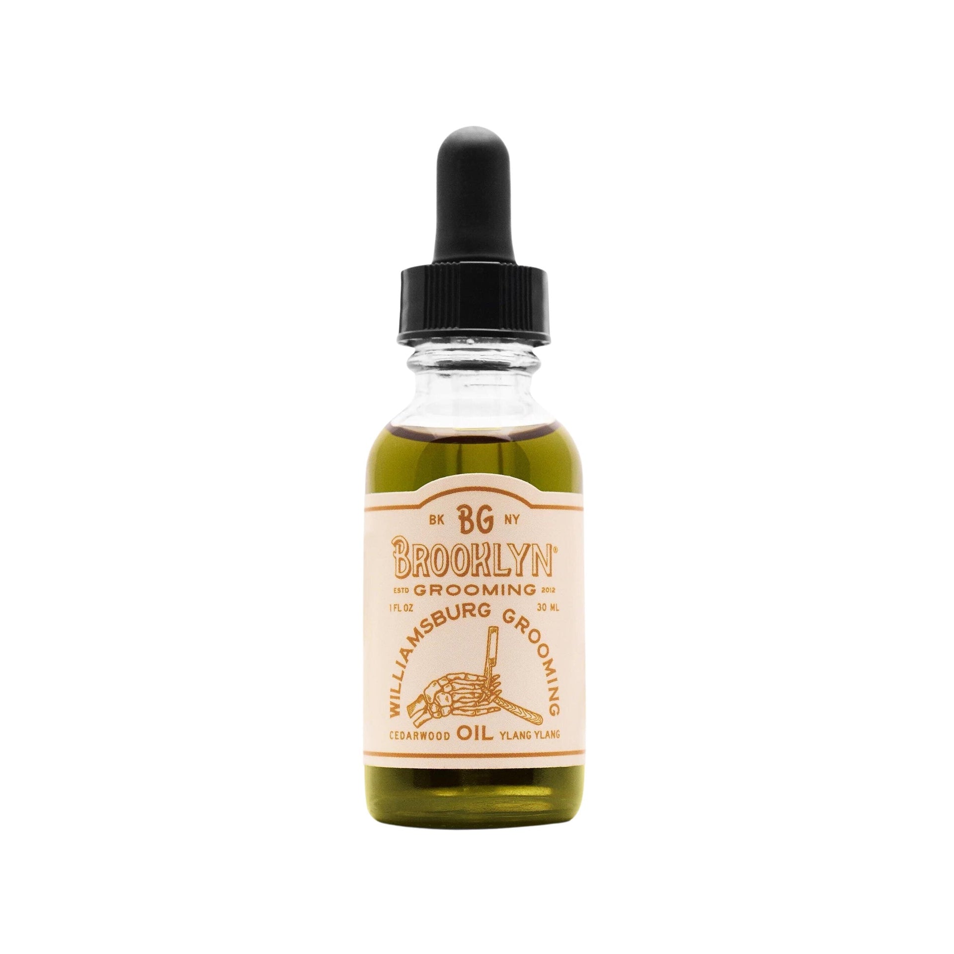 One ounce glass bottle of Williamsburg Grooming Oil with a black dropper cap.