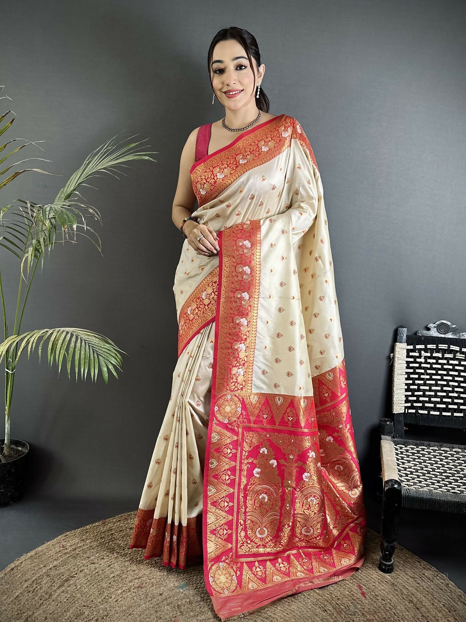 Off White Soft Silk Banarasi Saree with intricate motifs and a Gajari butti pattern blouse
