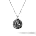 Sterling Silver Lion pendant featuring detailed engraving on a metallic background
