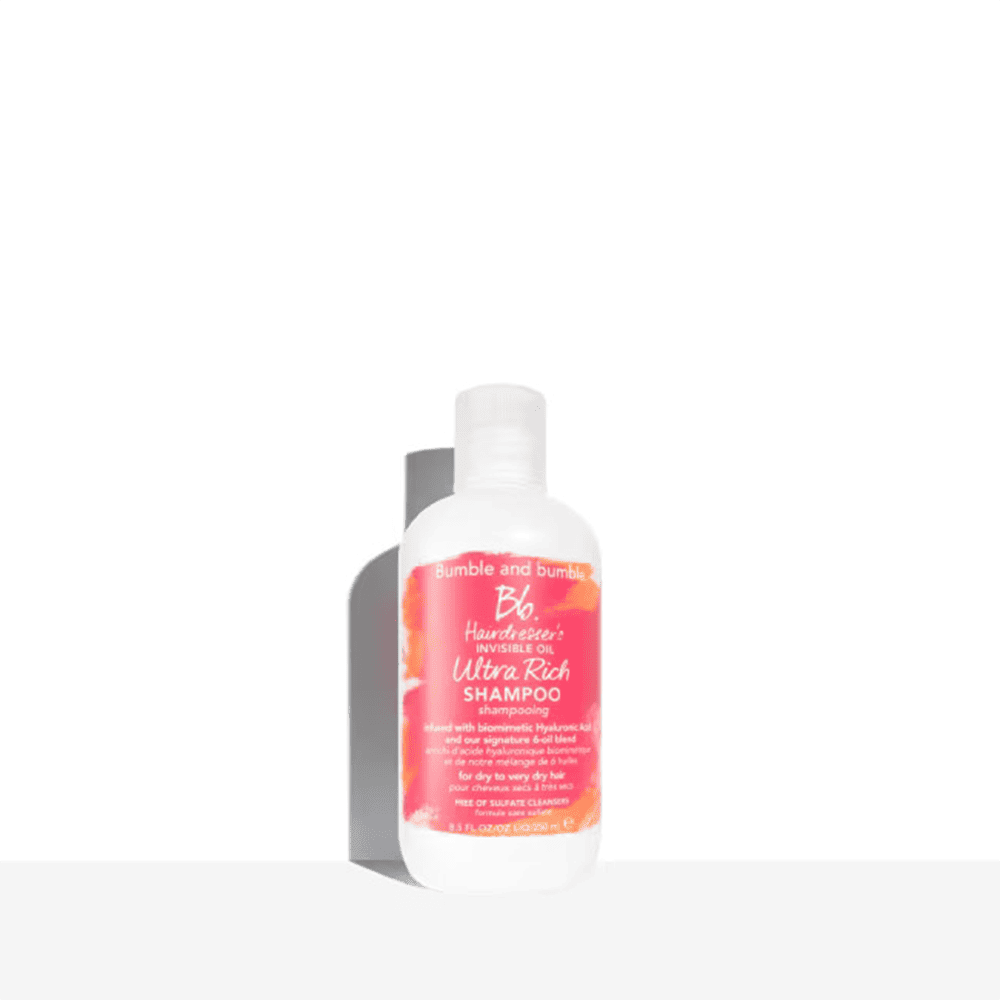 Bumble and bumble Hairdresser's Invisible Oil Ultra Rich Shampoo bottle in white and orange packaging.