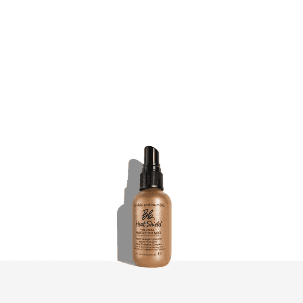 Bumble and bumble Heat Shield Thermal Protection Mist in gold and black bottle.