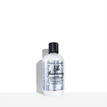 Bottle of Bumble and Bumble Thickening Volume Conditioner for voluminous hair styling