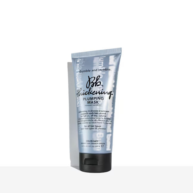 A grey 6.7 oz tube of Bumble and bumble Thickening Plumping Mask with black text.