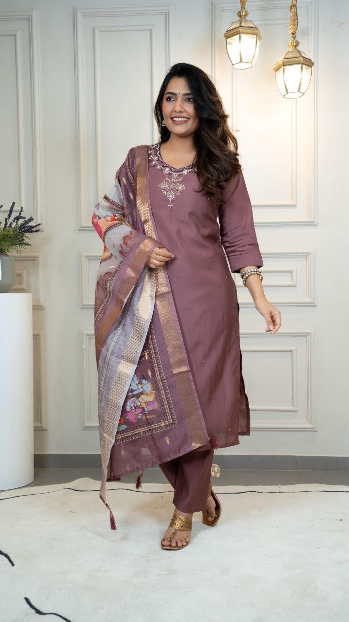 Burgundy Roman Silk kurta with delicate hand work, matching pants, and dupatta.