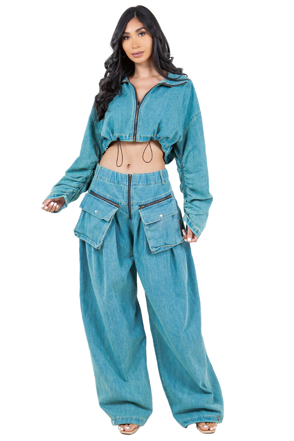 Women wearing a stylish denim two piece pant set by BY CLAUDE
