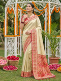 Model wearing a vibrant red soft silk saree with matching blouse piece