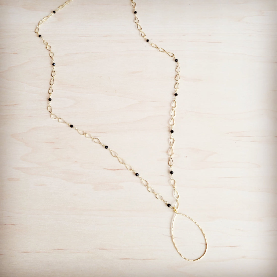 Gold-Tone Infinity Chain Necklace with Black Faceted Beads - Image 4