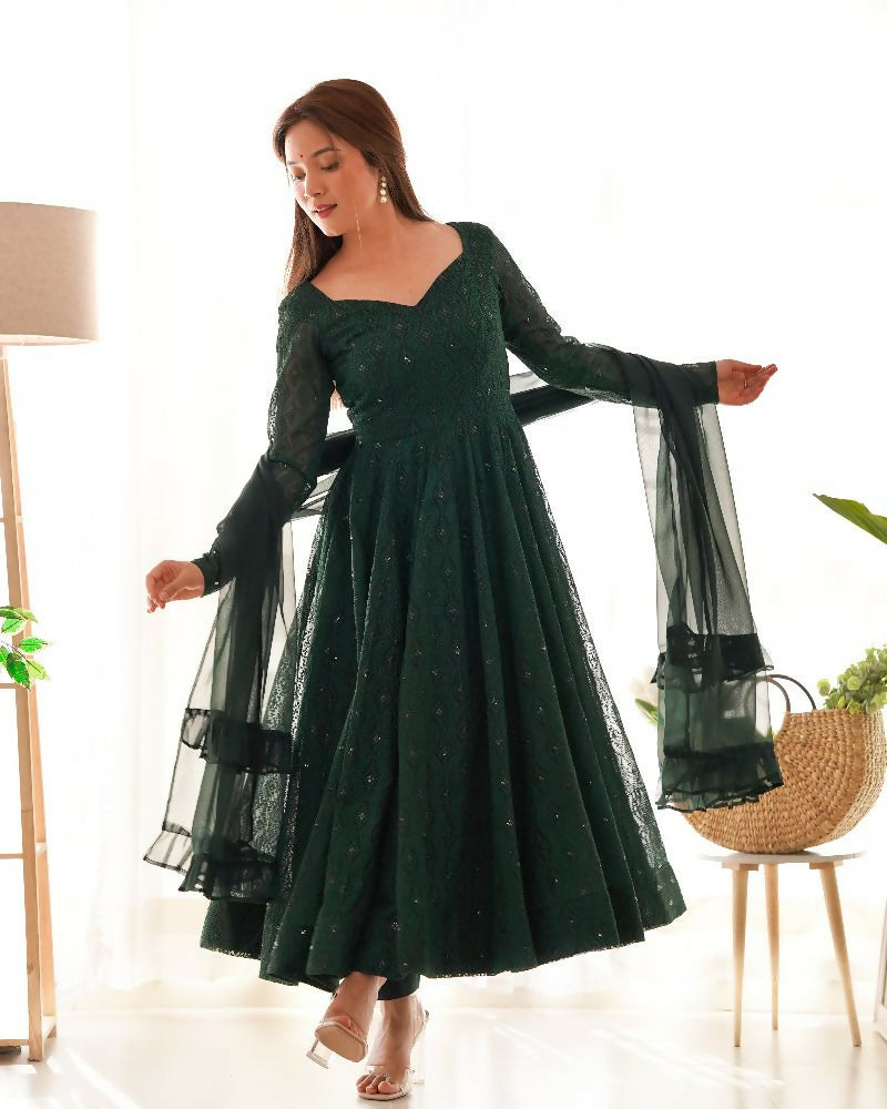 Elegant green georgette kurta set with detailed sequence embroidery and matching dupatta