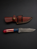 Limited edition Titan Stars & Steel Damascus folding knife with patriotic red, white, and blue handle.