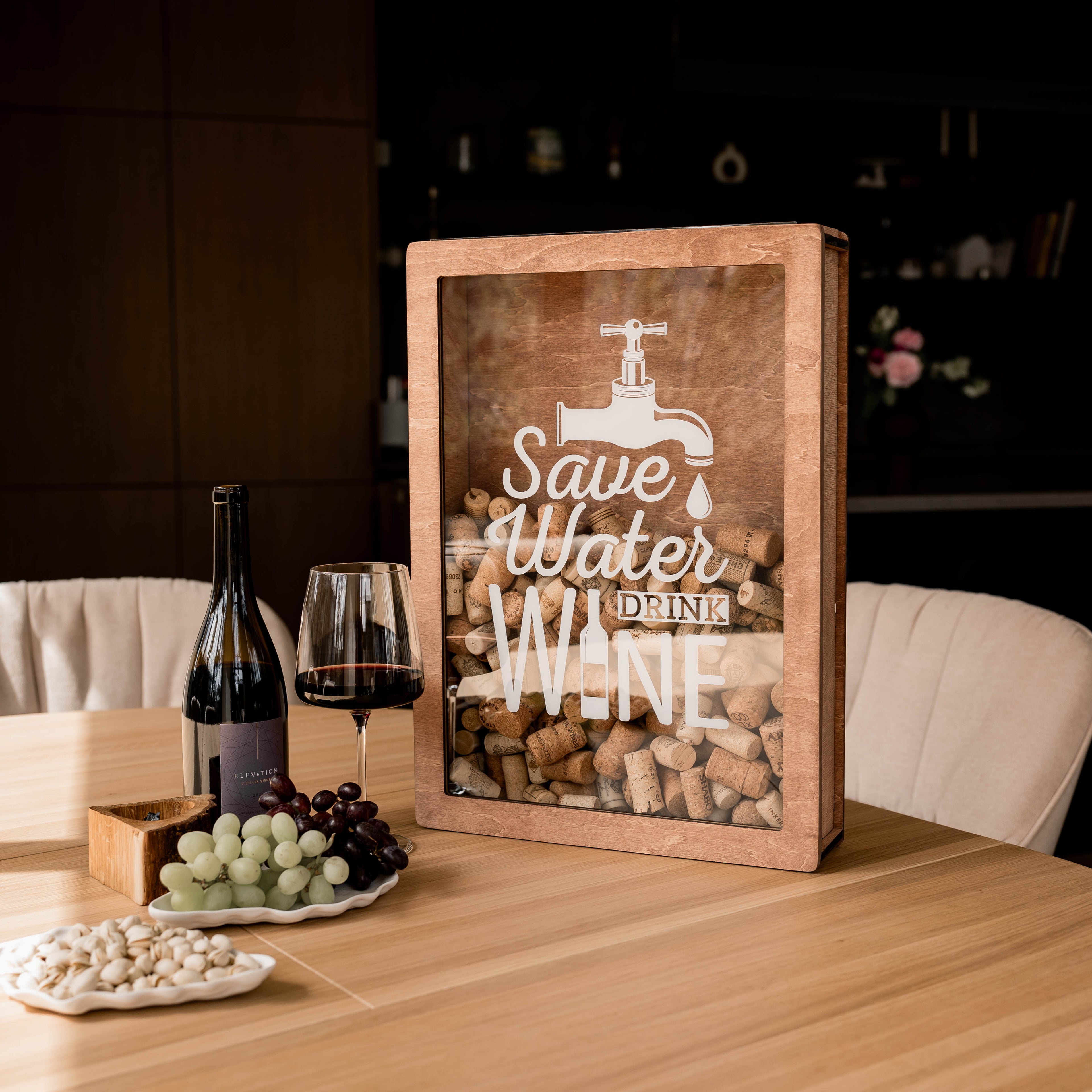 A natural wooden wedding card box styled for a guest book table
